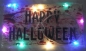 Preview: OYEFLY Holzschild "Happy Halloween" mit bunter LED-Beleuchtung, 30 x 15 cm