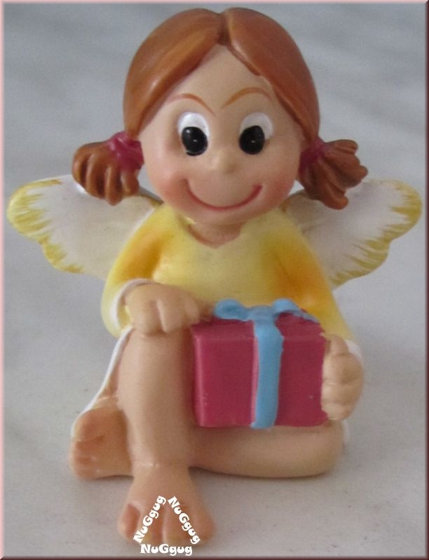 Engel Figur sitzend. gelb. mit Geschenk